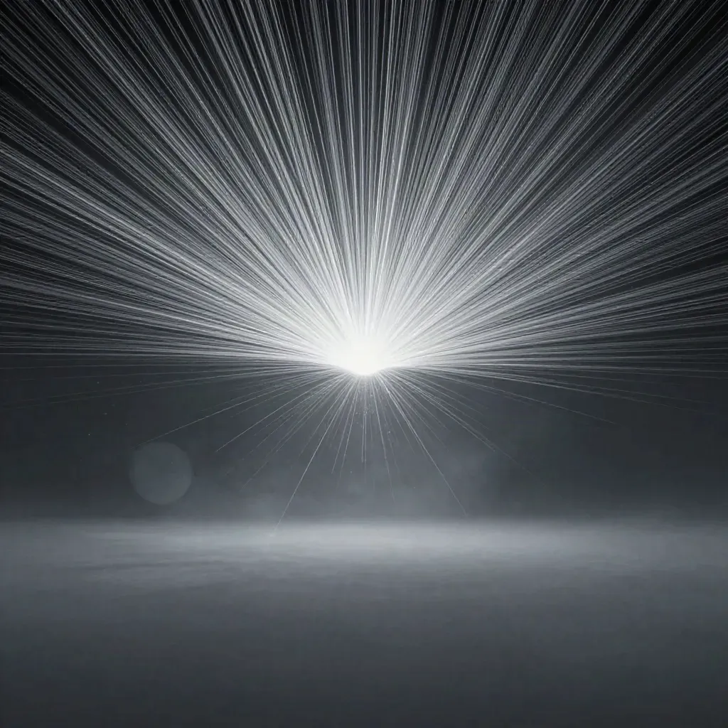 Silver light filaments converge into a soft white bloom in dark graphite space.